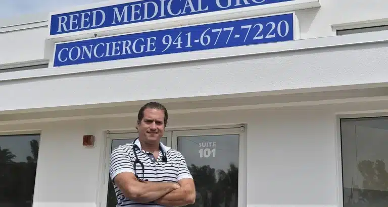 Dr. Reed outside Reed Medical Group