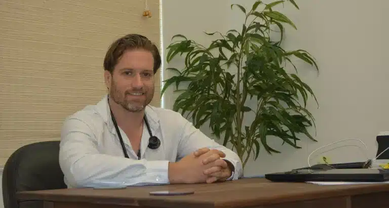 Dr. Reed at his desk